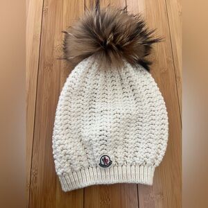 Moncler cream knit beanie with real raccoon fur pom pom